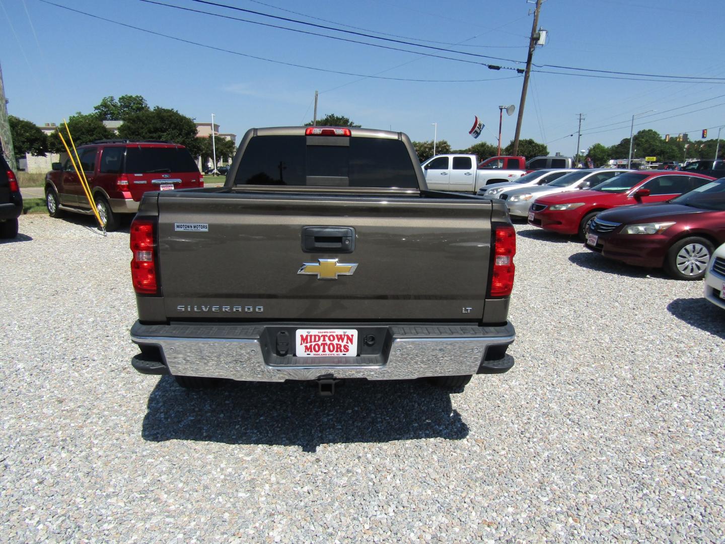 2015 Brown /Tan Chevrolet Silverado 1500 LT Double Cab 2WD (1GCRCRECXFZ) with an 5.3L V8 OHV 16V engine, Automatic transmission, located at 15016 S Hwy 231, Midland City, AL, 36350, (334) 983-3001, 31.306210, -85.495277 - Photo#6